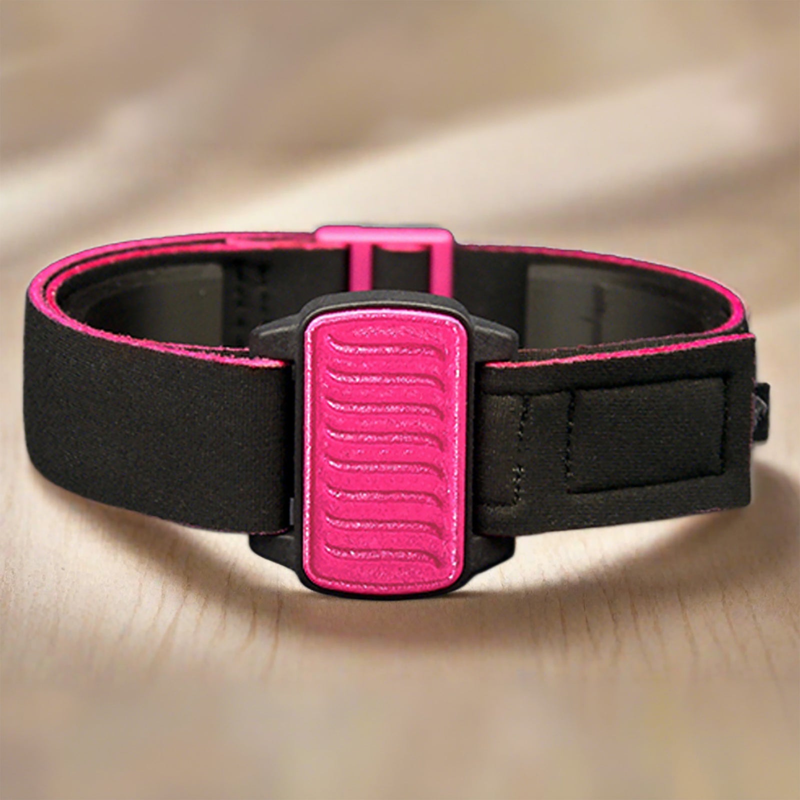 Dexband CGM armband for Dexcom G6 and ONE+ with magenta wave cover and water-resistant neoprene strap in gym setting