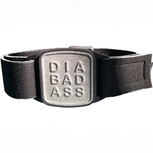 Dexband CGM armband with pewter Diabadass cover and neoprene strap, compatible with Dexcom G7 and ONE+ sensors to help reduce risk of being knocked or falling off.