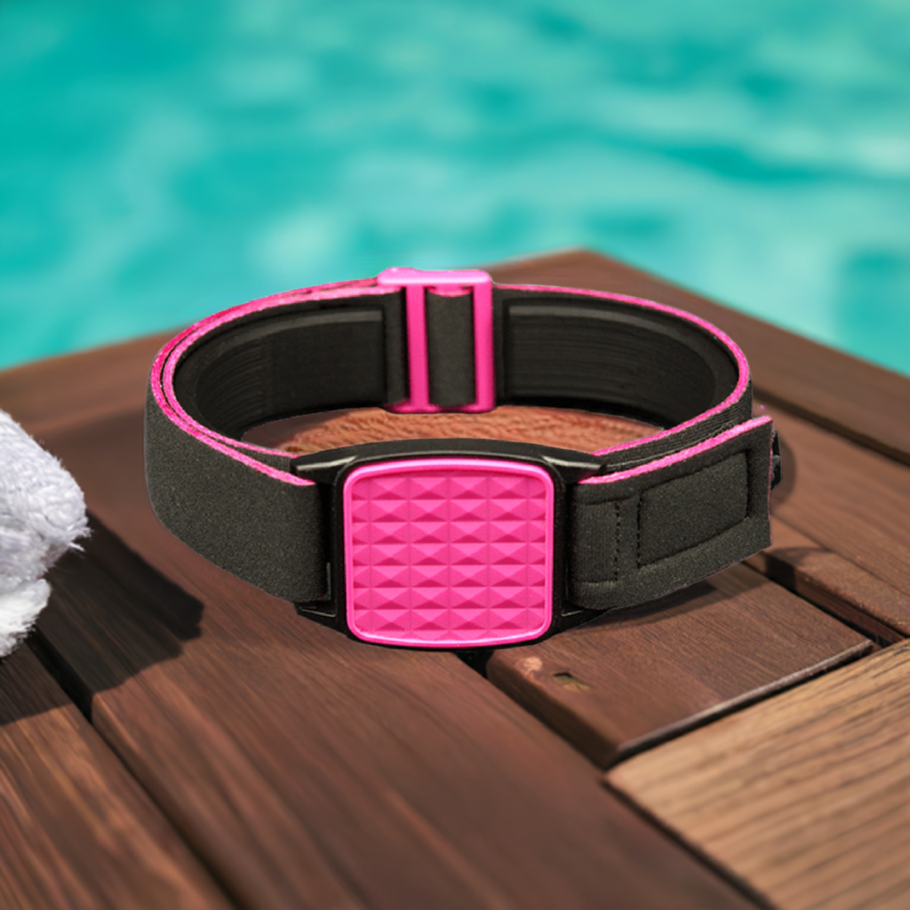 Libreband Armband for Freestyle Libre 1 & 2. Magenta cover with Pyramids design. Shown with swimming pool background.