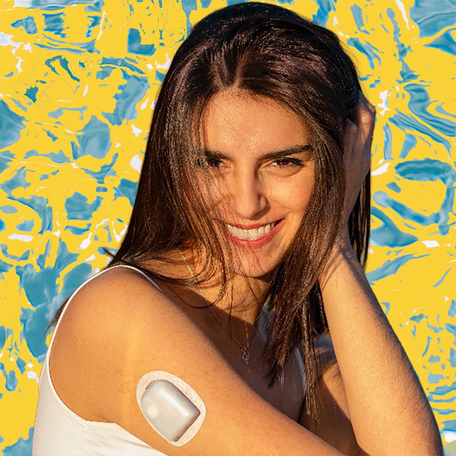 Omnipod worn on woman's upper arm.