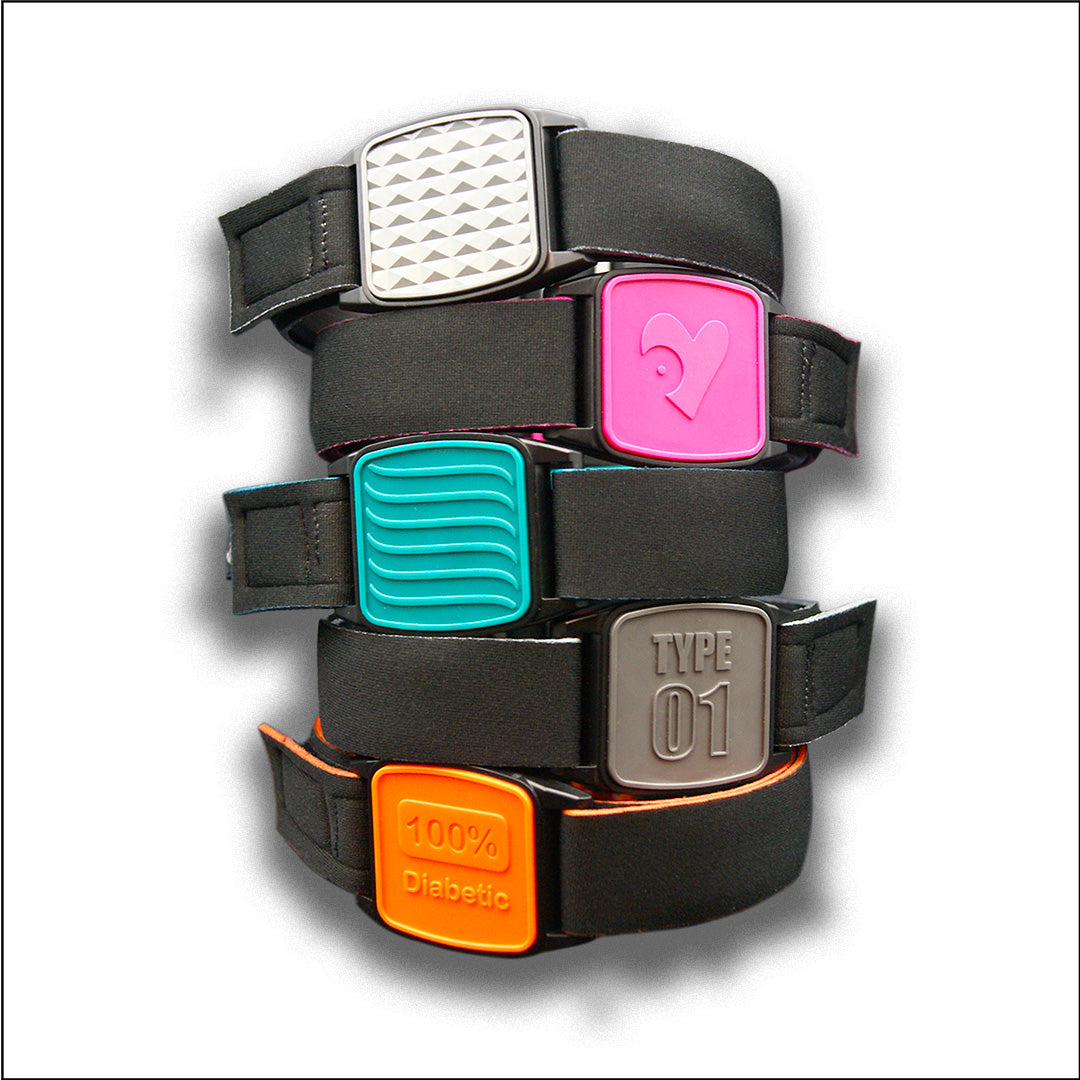 Stack of Libreband armbands for FreeStyle Libre sensors.