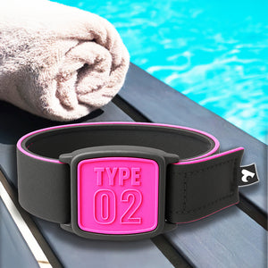 Libreband CGM armband for FreeStyle Libre 2 with magenta Type 02 cover and neoprene strap in swimming pool setting.