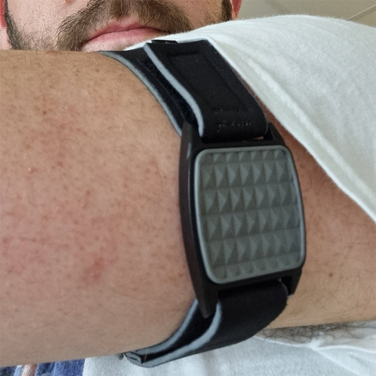Libreband CGM armband for FreeStyle Libre with pewter pyramids cover and black neoprene strap worn on upper arm, customer review photo