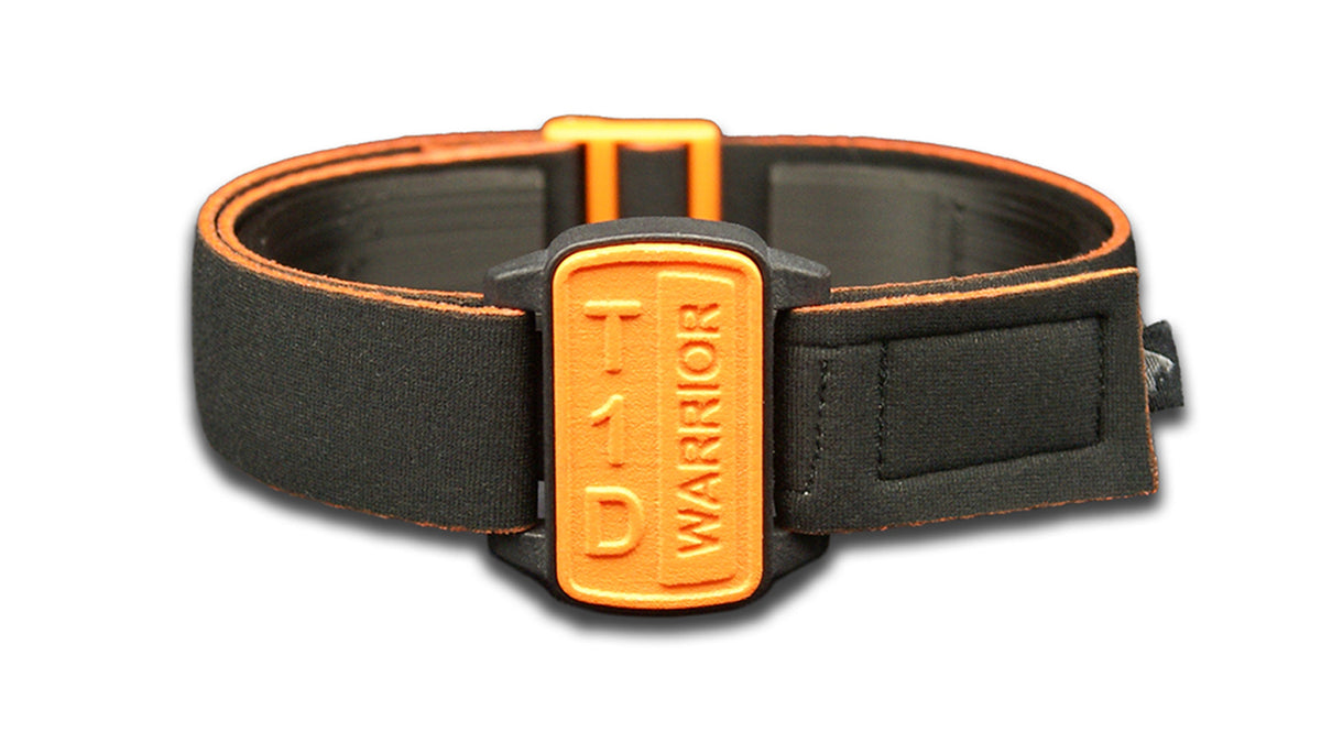 Dexband armband cover in orange with motif T1D Warrior. Black strap edged in coordinating orange. 