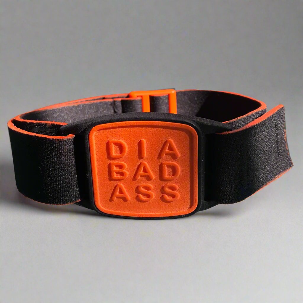 Dexband armband in orange with DIABADASS cover.