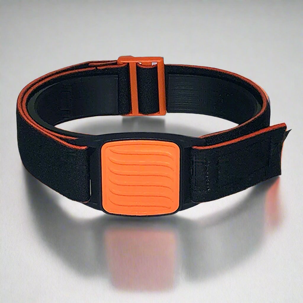 Dexband Armband for Dexcom G7, black strap with orange wave design cover. 