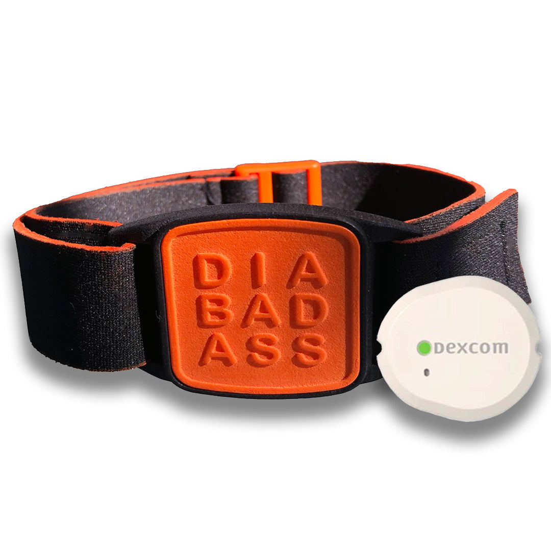 Dexband armband in orange with DIABADASS cover. Shown with Dexcom G7 CGM. LML4016, LML4023, LML4030, LML5006.