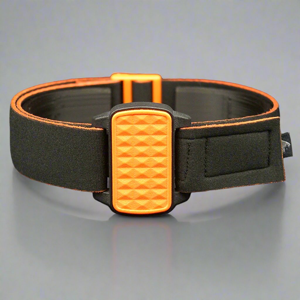 Dexband armband cover for Dexcom G6 with black strap and orange pyramids cover.