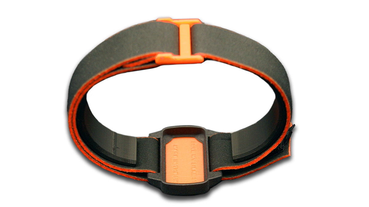 Reverse image of Dexband armband for Dexcom G6 with black strap and orange cover. 