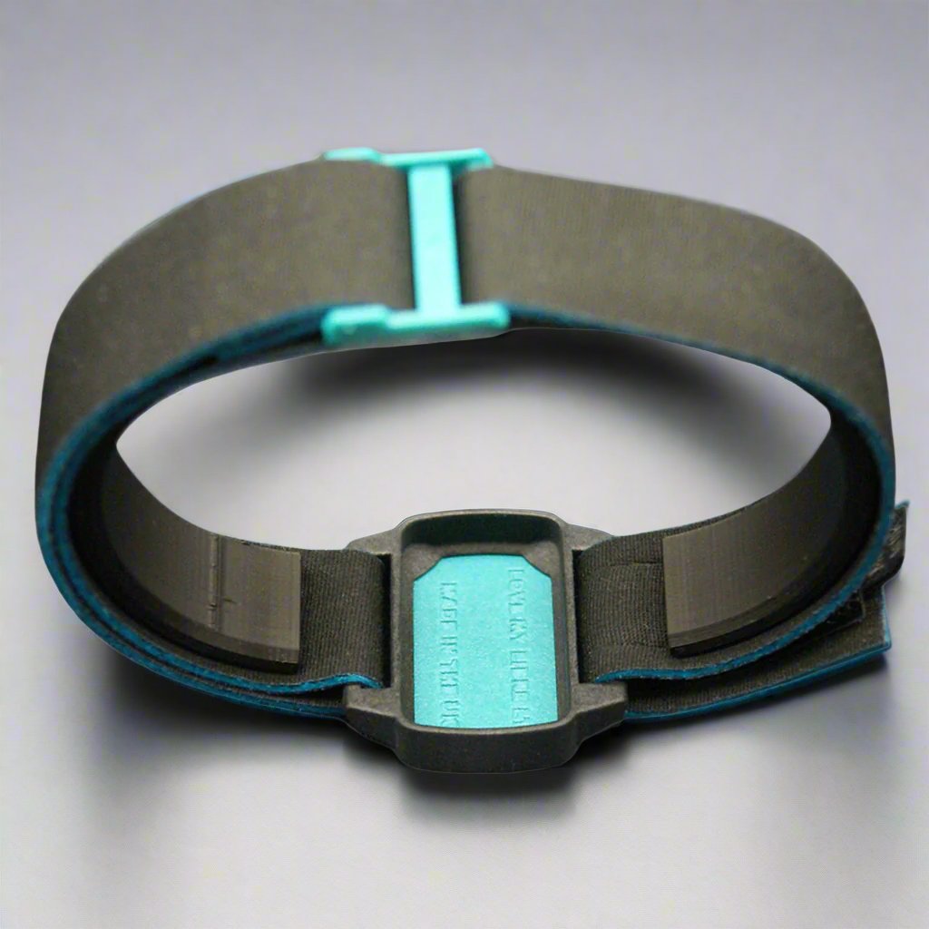 Reverse image of Dexband with black strap and teal cover for Dexcom G6 sensor.