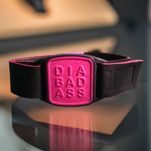Dexband armband for Dexcom G7 & Stelo CGM in magenta with DIABADASS style cover and black neoprene strap. LML3989, LML3996, LML4009, LML4986.