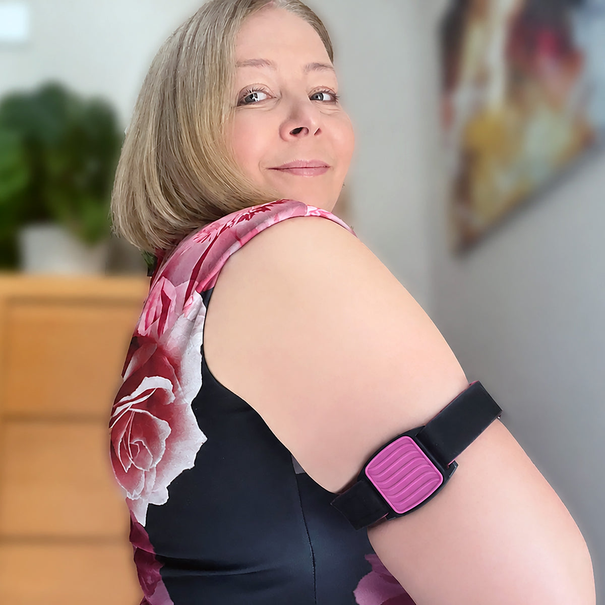 Dexband CGM armband for Dexcom G7 and ONE+ sensors with magenta wave cover and neoprene strap worn on upper arm. LML3897, LML3903, LML3910, LML4993.