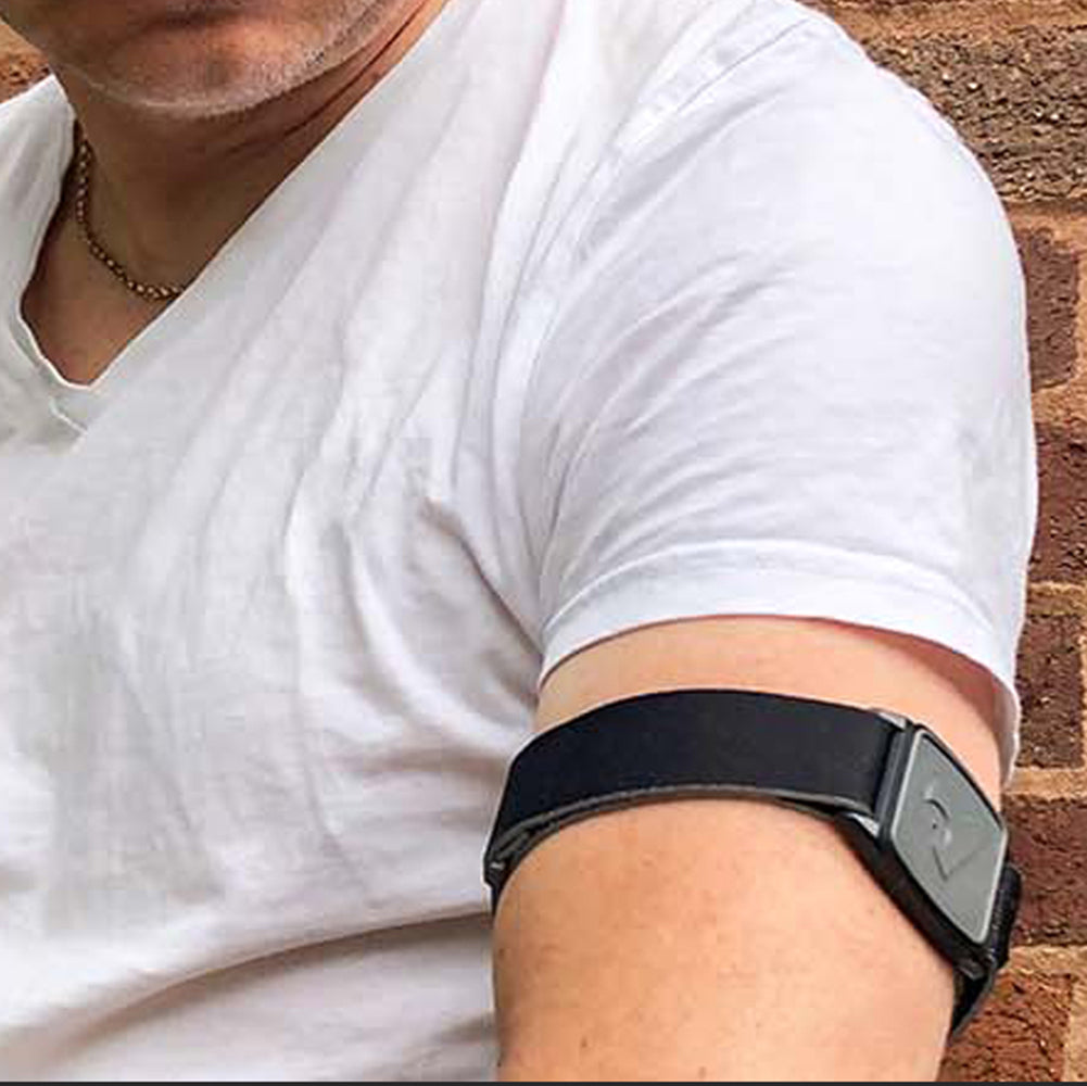 Model wearing Libreband armband cover in pewter with heart design. Black strap edged in coordinating pewter. LML4627, LML2944, LML2579, LML2586.