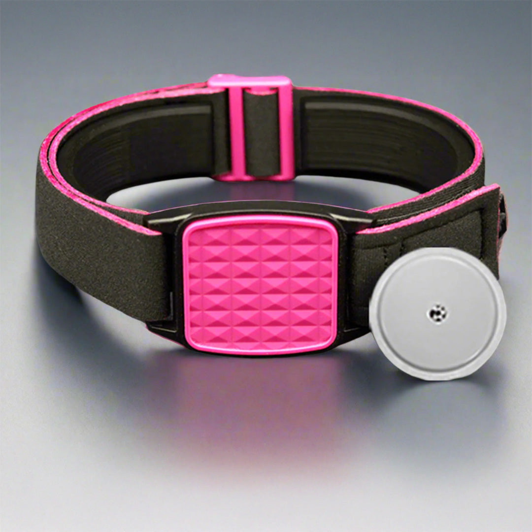 Libreband Armband for Freestyle Libre 1 & 2. Magenta cover with Pyramids design. Shown with swimming pool background.