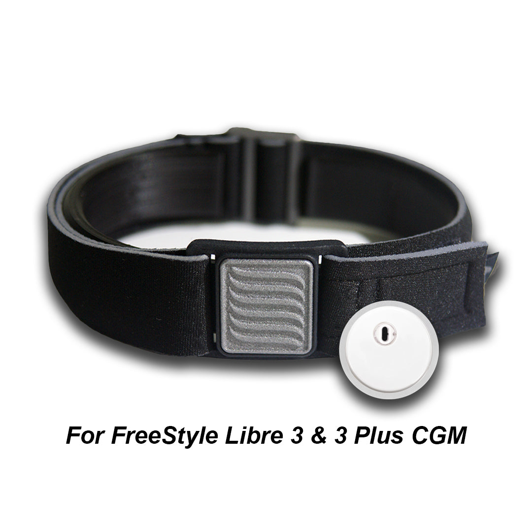 Libreband Armband for Freestyle Libre 3, shown in beach scene. Pewter cover with wave design.