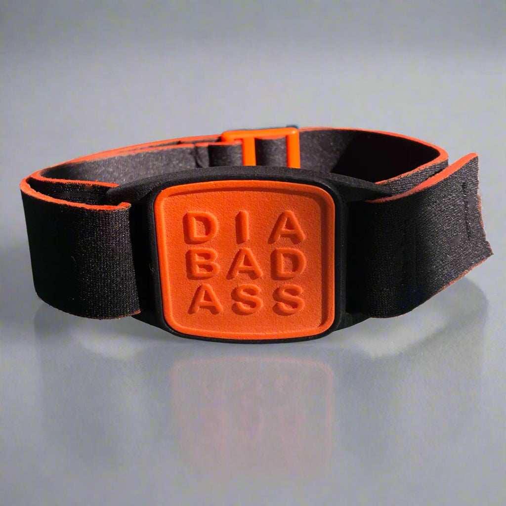 Libreband armband for Freestyle Libre sensor CGM. Orange  Diabadass cover and black strap.