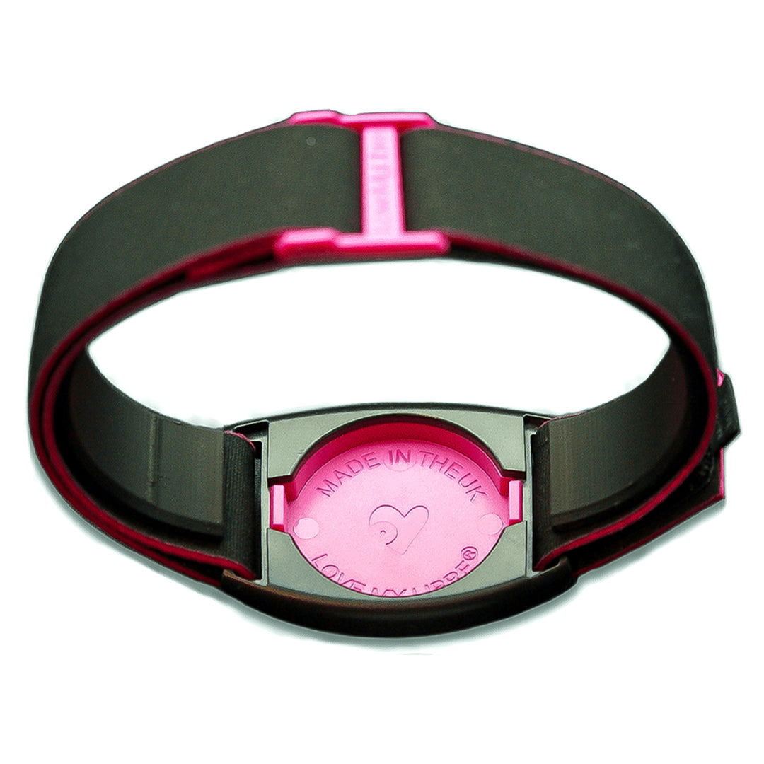 Libreband Armband in reverse with magenta cover. Shown with Freestyle Libre 2 sensor.