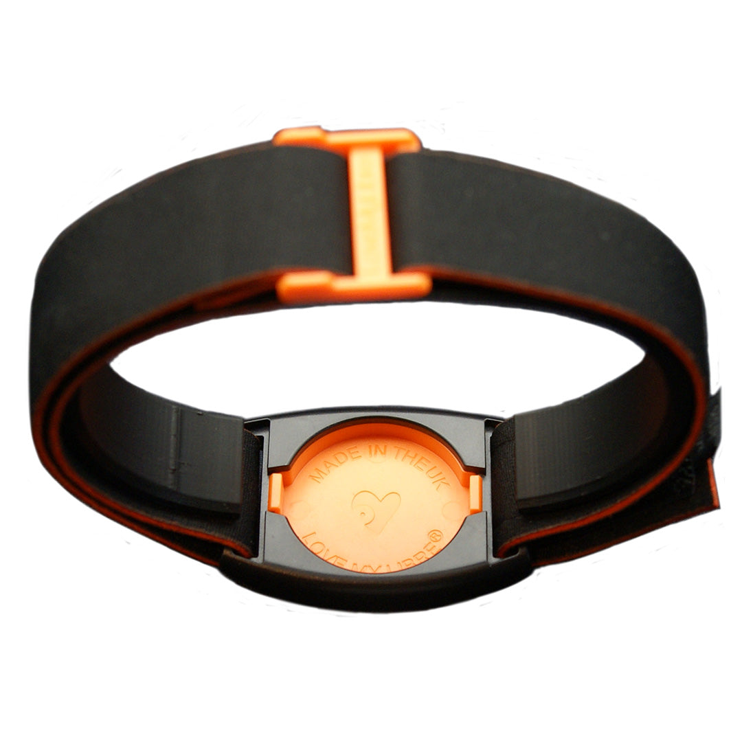 Reverse view of Libreband Armband for Freestyle Libre 1 &amp; 2 with orange cover and black strap.