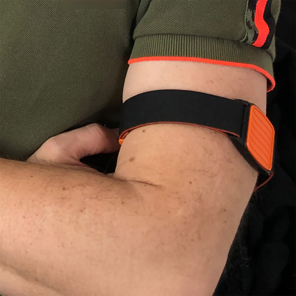 Libreband CGM armband orange wave cover close-up, compatible with FreeStyle Libre 2, showing wave design detail. LML4597, LML2975, LML2258, LML2265.