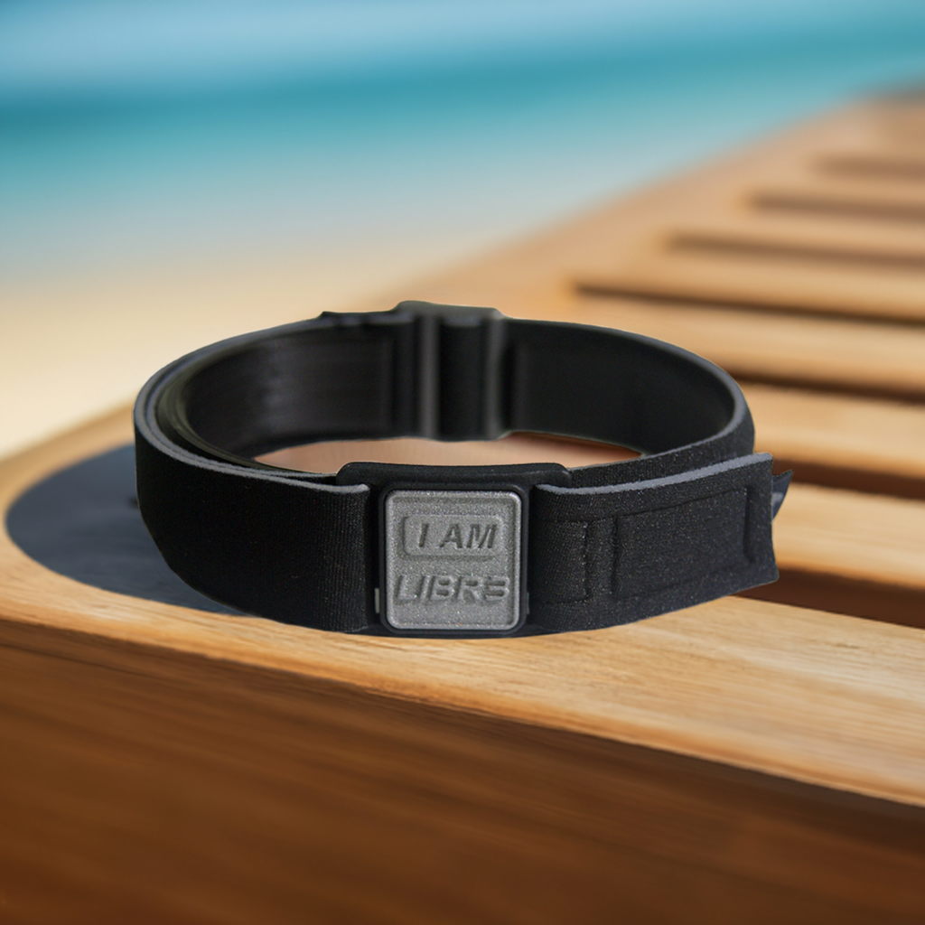 Libreband CGM armband for FreeStyle Libre 3 with pewter I AM LIBR3 cover and water-resistant neoprene strap on beach lounger for swimming and holidays