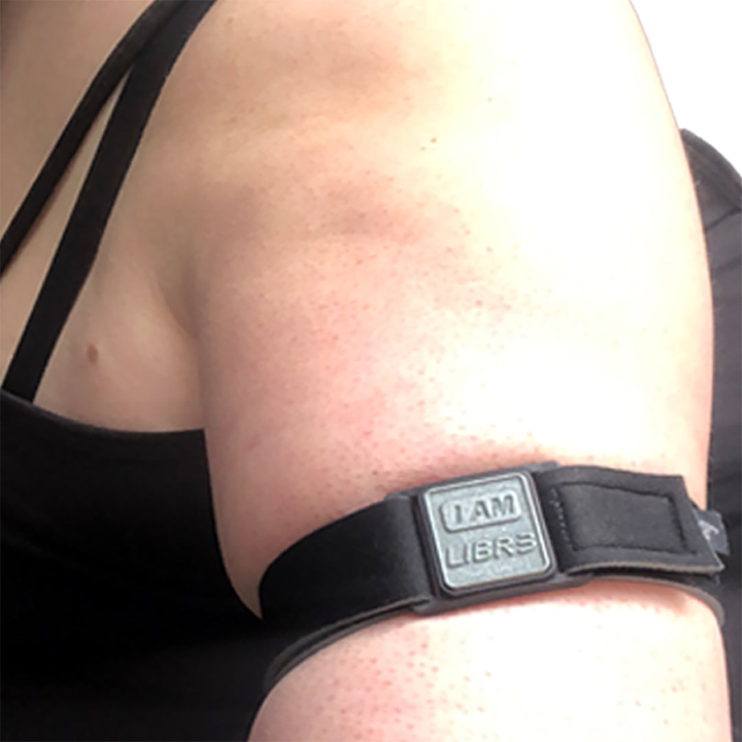 Libreband CGM armband for FreeStyle Libre 3 with pewter I AM LIBR3 cover and water-resistant neoprene strap worn on upper arm to help reduce risk of sensors being knocked or falling off. LML4788, LML4429, LML4412, LML4405.