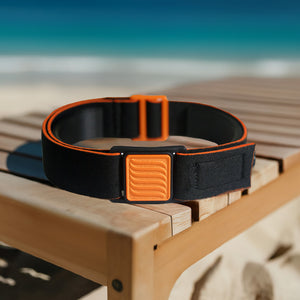 Libreband CGM armband for FreeStyle Libre 3 with orange wave cover and water-resistant neoprene strap on beach lounger