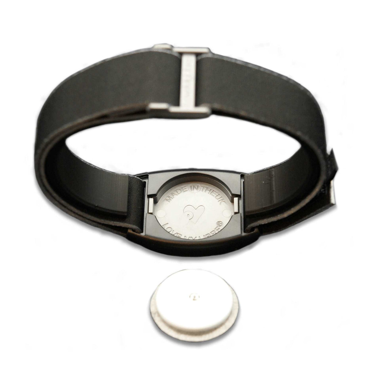 Reverse image of Libreband in pewter and black. Protection for FreeStyle Libre sensor, shown on image.